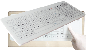 IQ Glastastatur, agiert auf einen Fingertip auch mit Handschuh - spezielle Tastatur für die medizinische Anwendung oder im Pharmazielabor. Als Tischgerät oder eingebaut in ein Edelstahlgehäuse. Drahtlos oder mit USB-Anschluss.